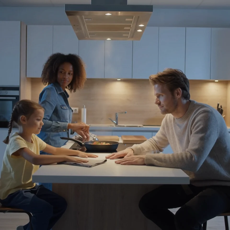 Family cooking together in the kitchen
